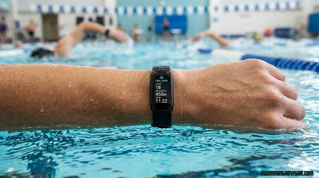 Budget fitness tracker with swim tracking mode displayed on screen